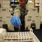 Laboratory technician analysing blood samples