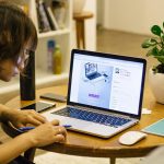 A freelancer working on a laptop